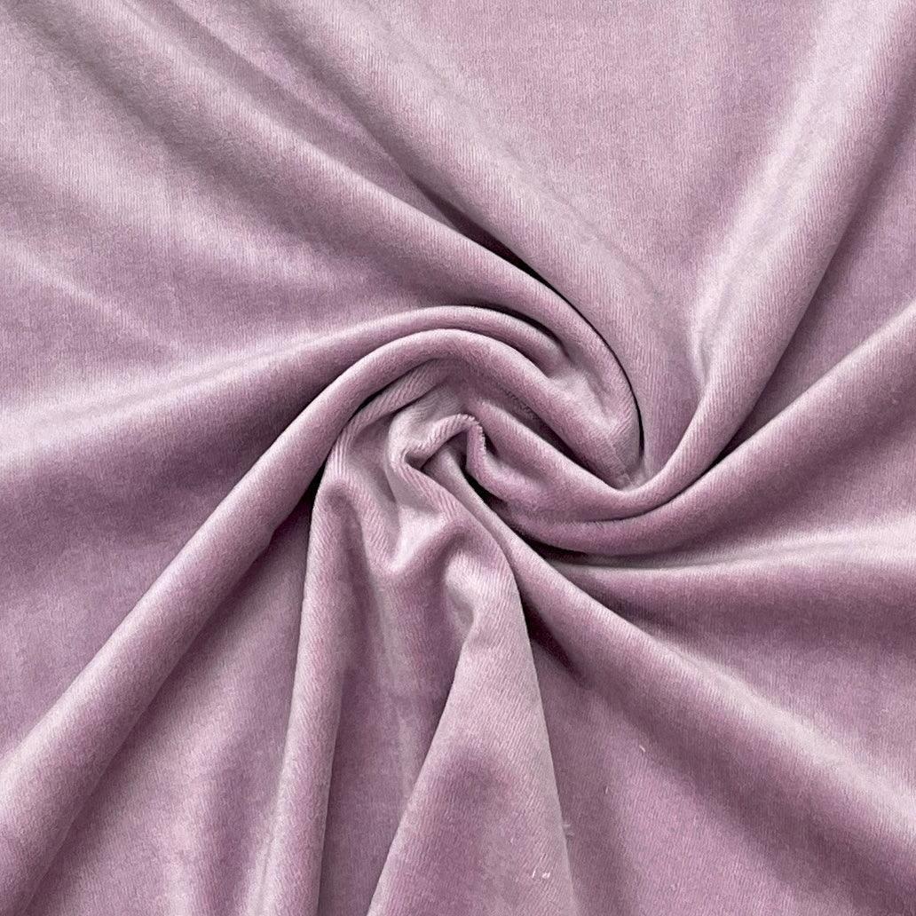 Nature's Fabrics draped purple velvet fabric showing soft texture and folds