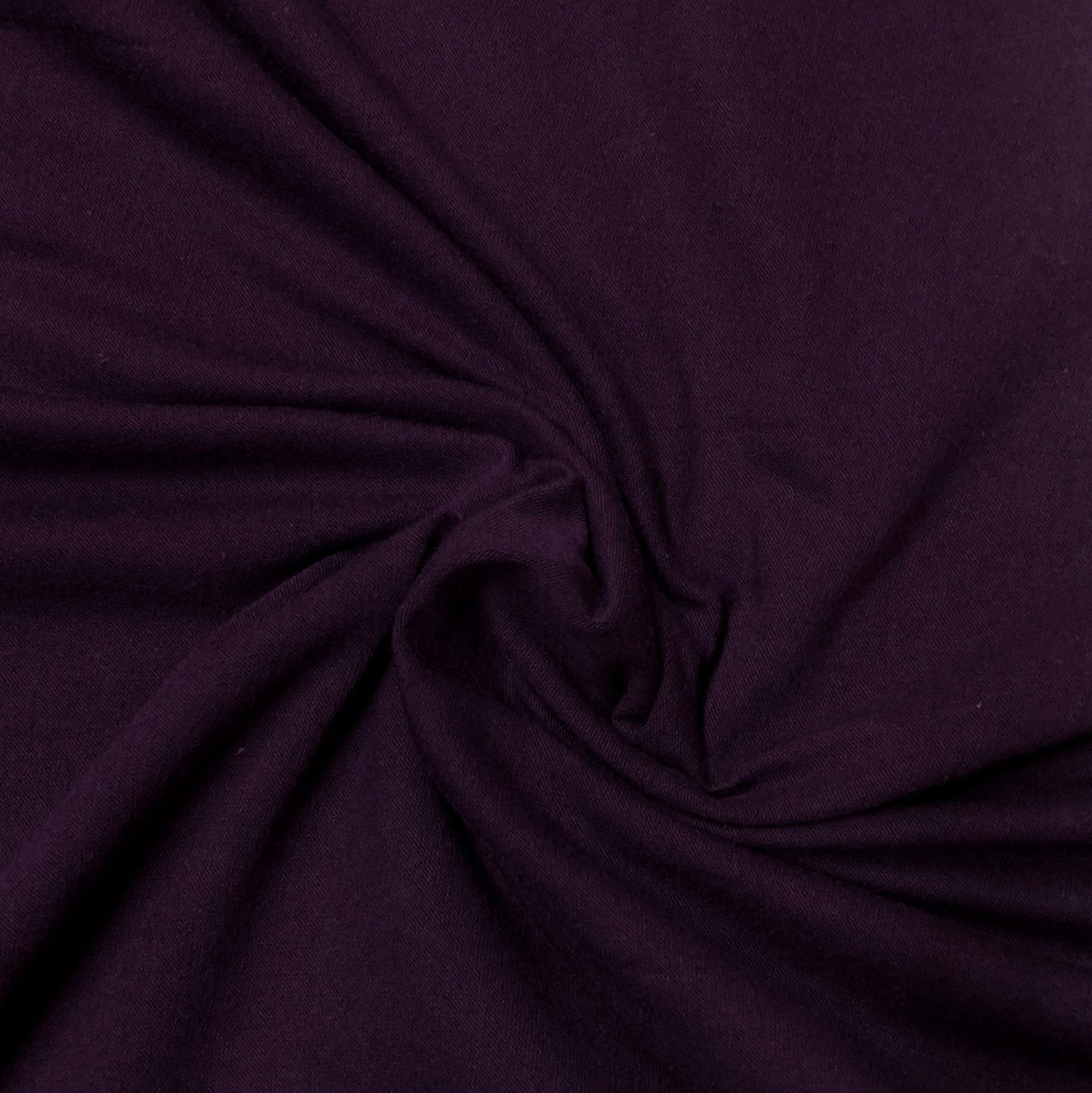 Deep purple organic cotton fabric by Nature's Fabrics, showcasing soft texture and natural drape