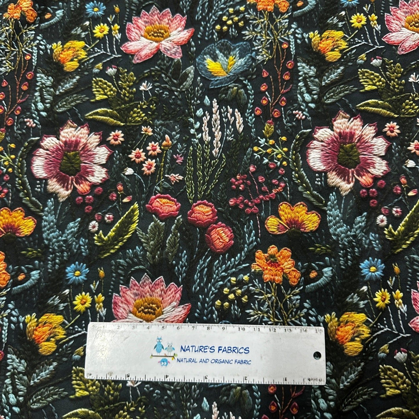 Embroidered Flower Garden on Polyester/Spandex Tricot Fabric - Nature's Fabrics