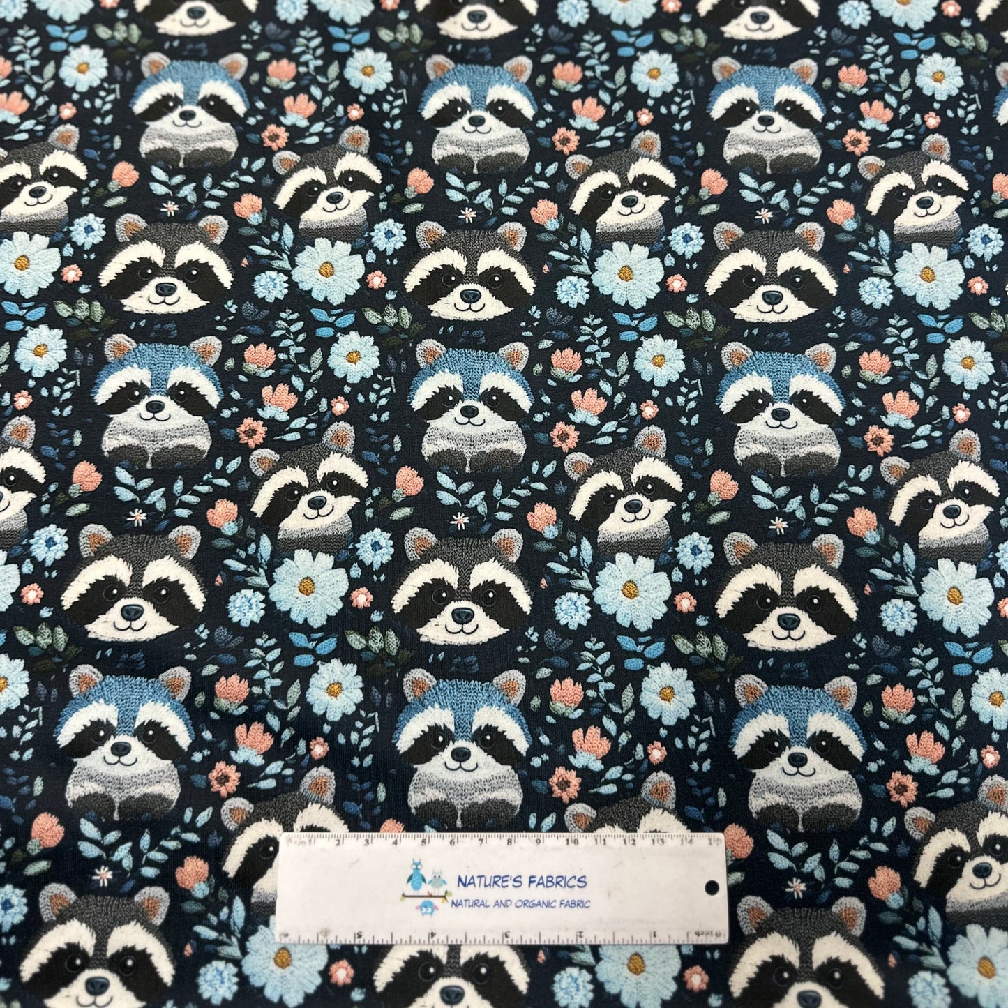 Embroidered Raccoons on Blue 1 mil PUL Fabric - Made in the USA - Nature's Fabrics