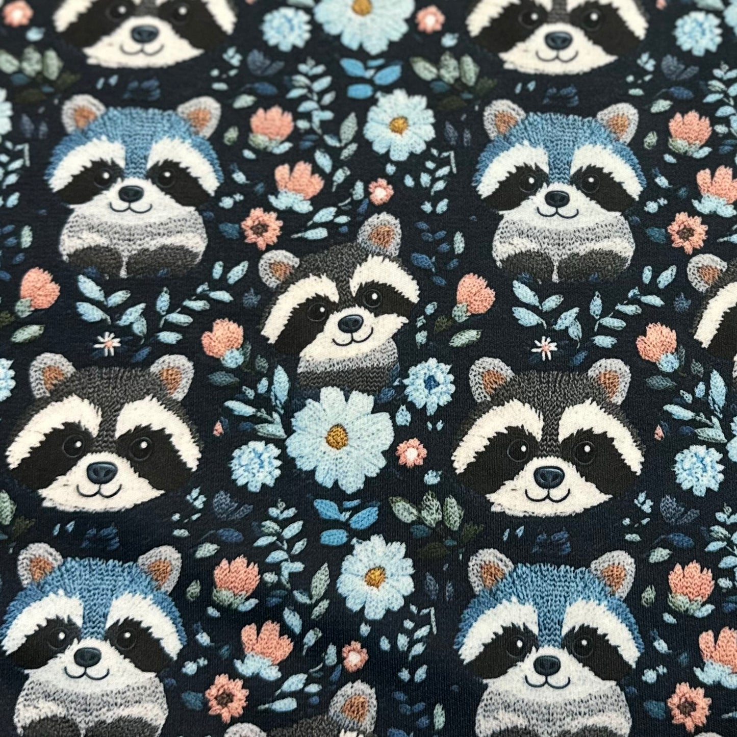 Embroidered Raccoons on Blue 1 mil PUL Fabric - Made in the USA - Nature's Fabrics