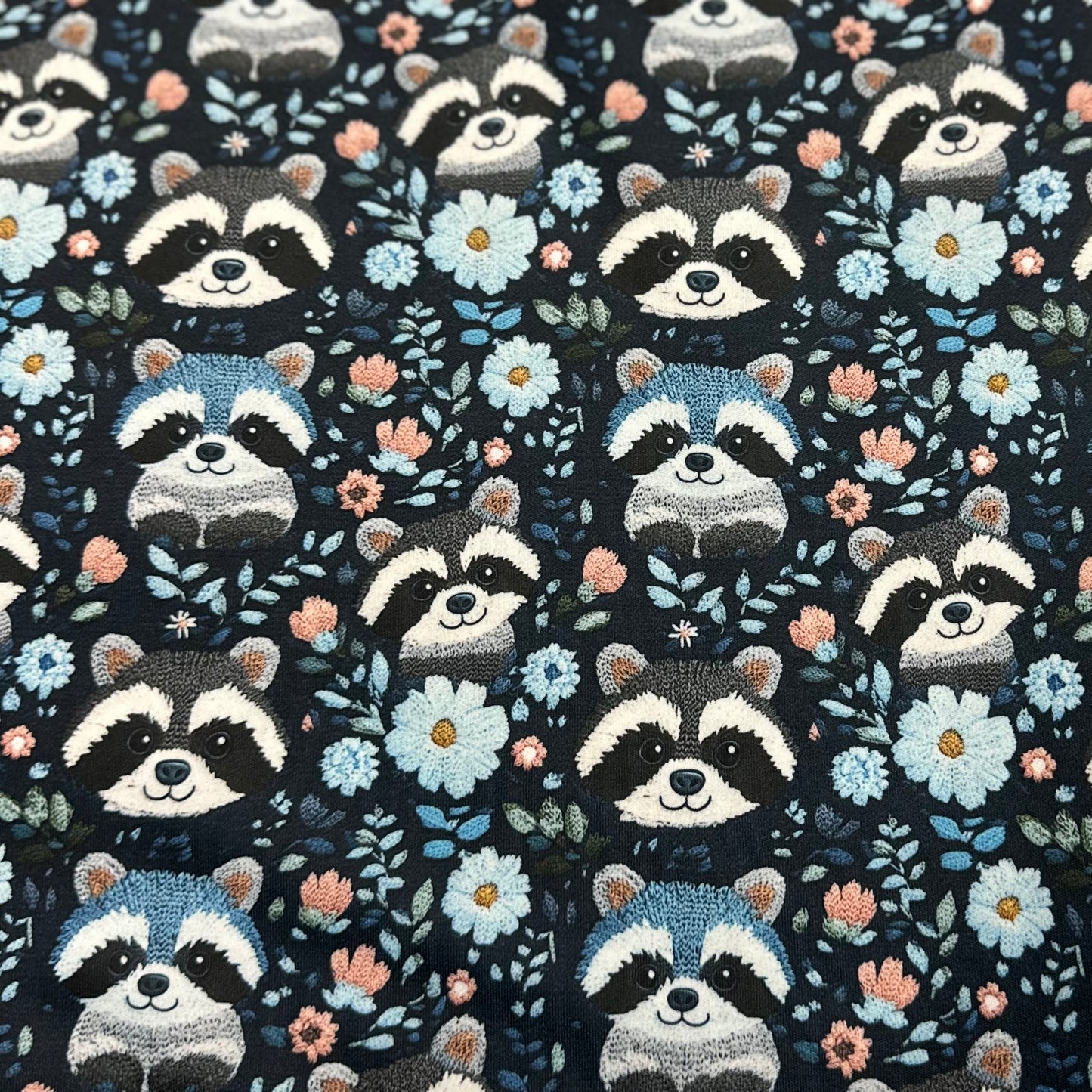 Embroidered Raccoons on Blue 1 mil PUL Fabric - Made in the USA - Nature's Fabrics