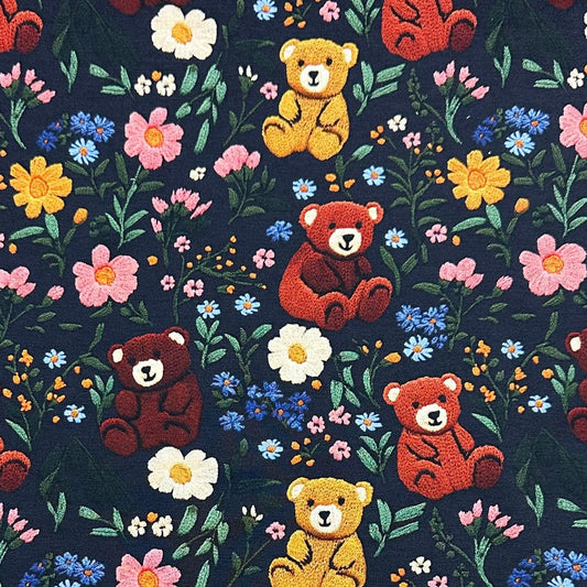 Nature's Fabrics dark blue organic cotton fabric with embroidered teddy bears and wildflowers