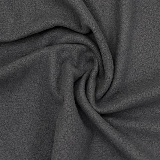 Close-up of draped charcoal grey wool fabric from Nature's Fabrics.