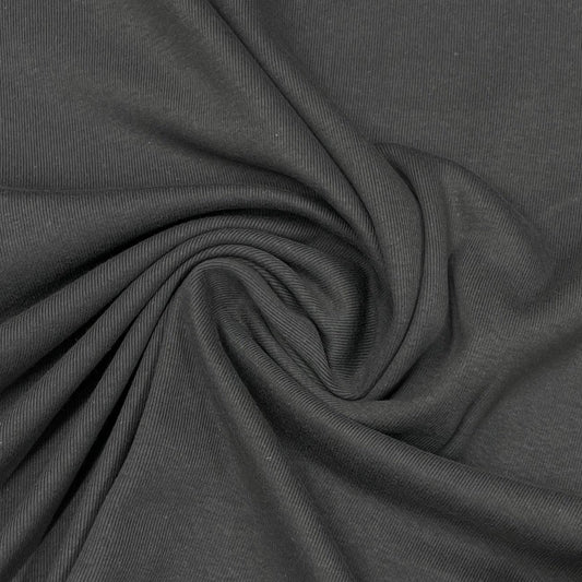 Swirl of dark grey ribbed fabric from Nature's Fabrics