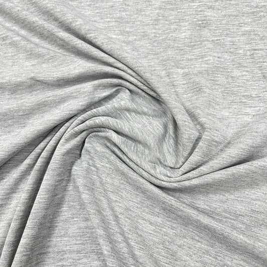 Close-up of draped heather grey natural fabric from Nature's Fabrics.