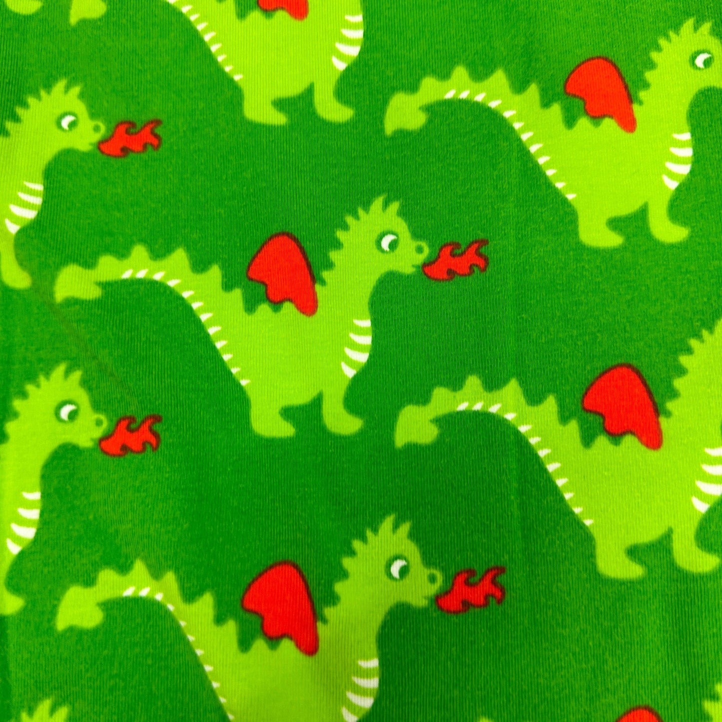 Green Dragons on Green Organic Cotton/Spandex Jersey Fabric - Nature's Fabrics