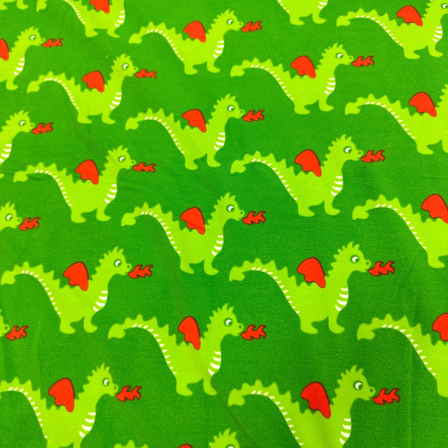Green Dragons on Green Organic Cotton/Spandex Jersey Fabric - Nature's Fabrics