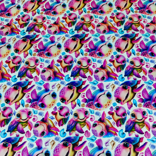 Colorful cartoon sea turtles and shells pattern fabric by Nature's Fabrics