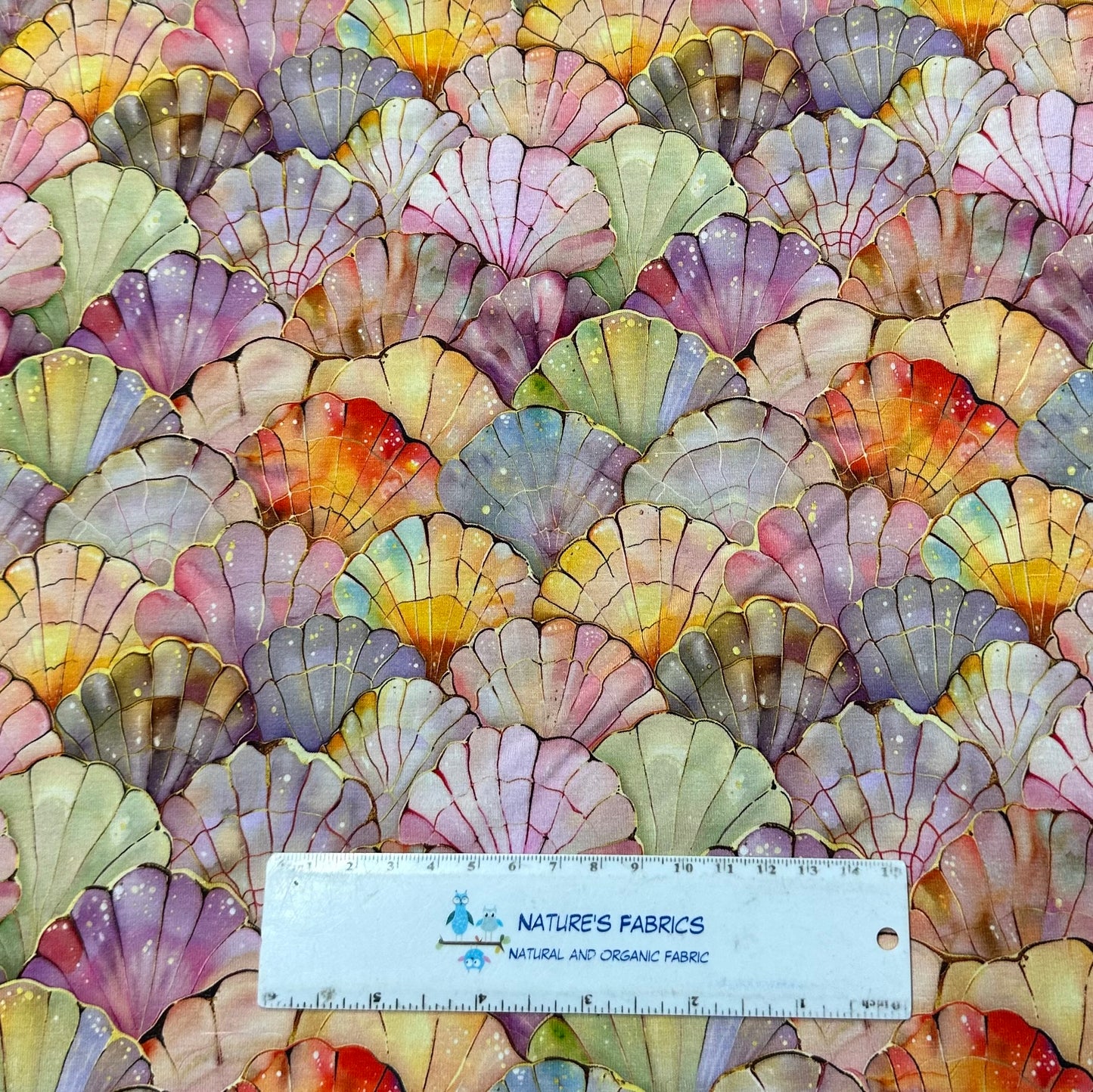 Iridescent Seashells on Bamboo/Spandex Jersey Fabric - Nature's Fabrics