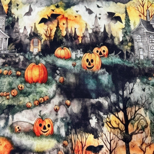 Nature's Fabrics Halloween fabric print with jack-o-lanterns, bats, and spooky houses.