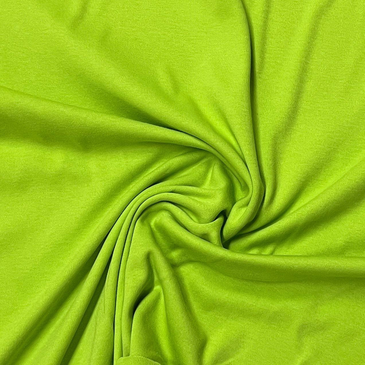 Swirl of lime green natural fabric from Nature's Fabrics