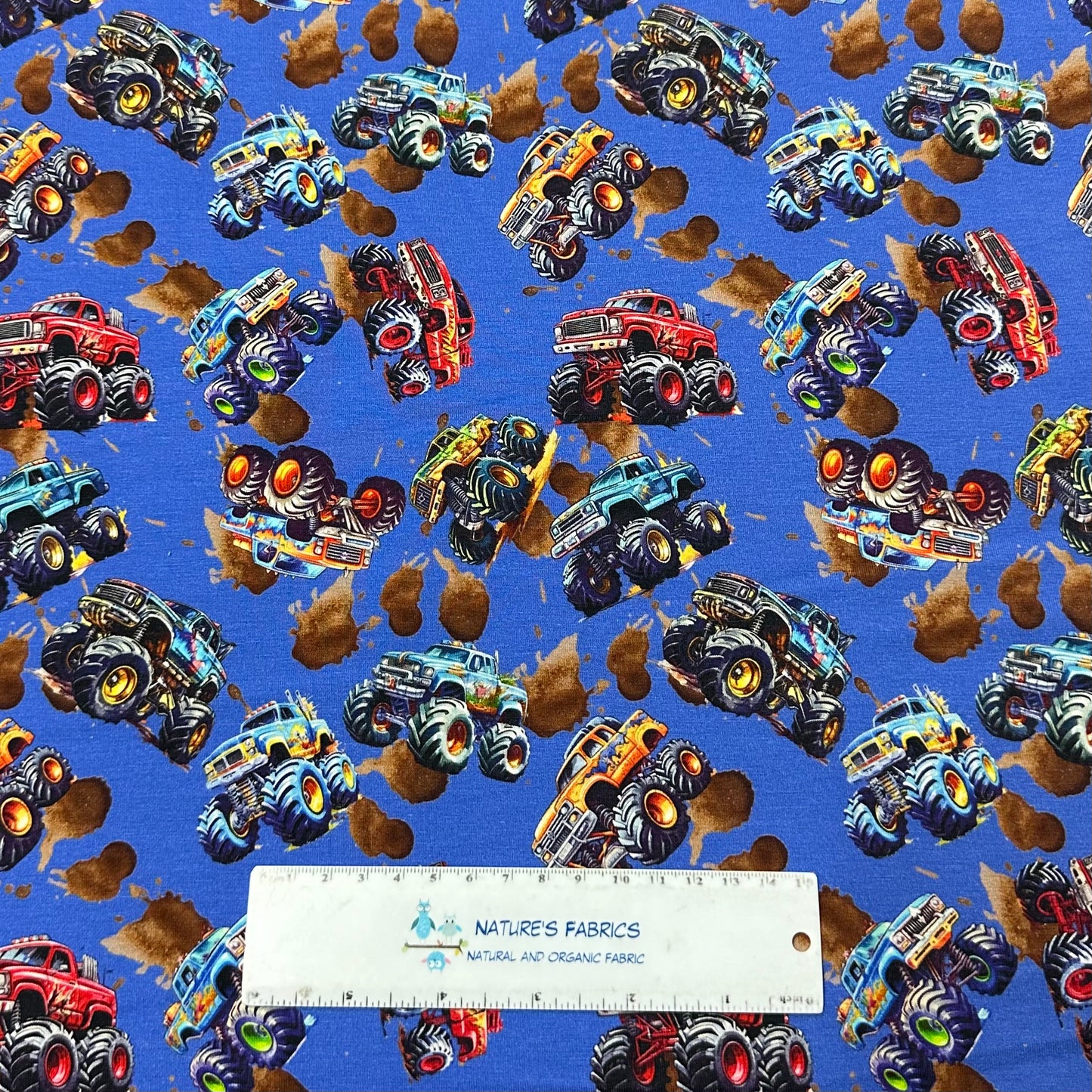 Monster Trucks on Organic Cotton/Spandex Jersey Fabric - Nature's Fabrics