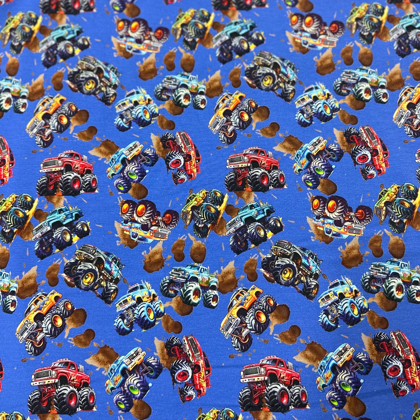 Monster Trucks on Organic Cotton/Spandex Jersey Fabric - Nature's Fabrics