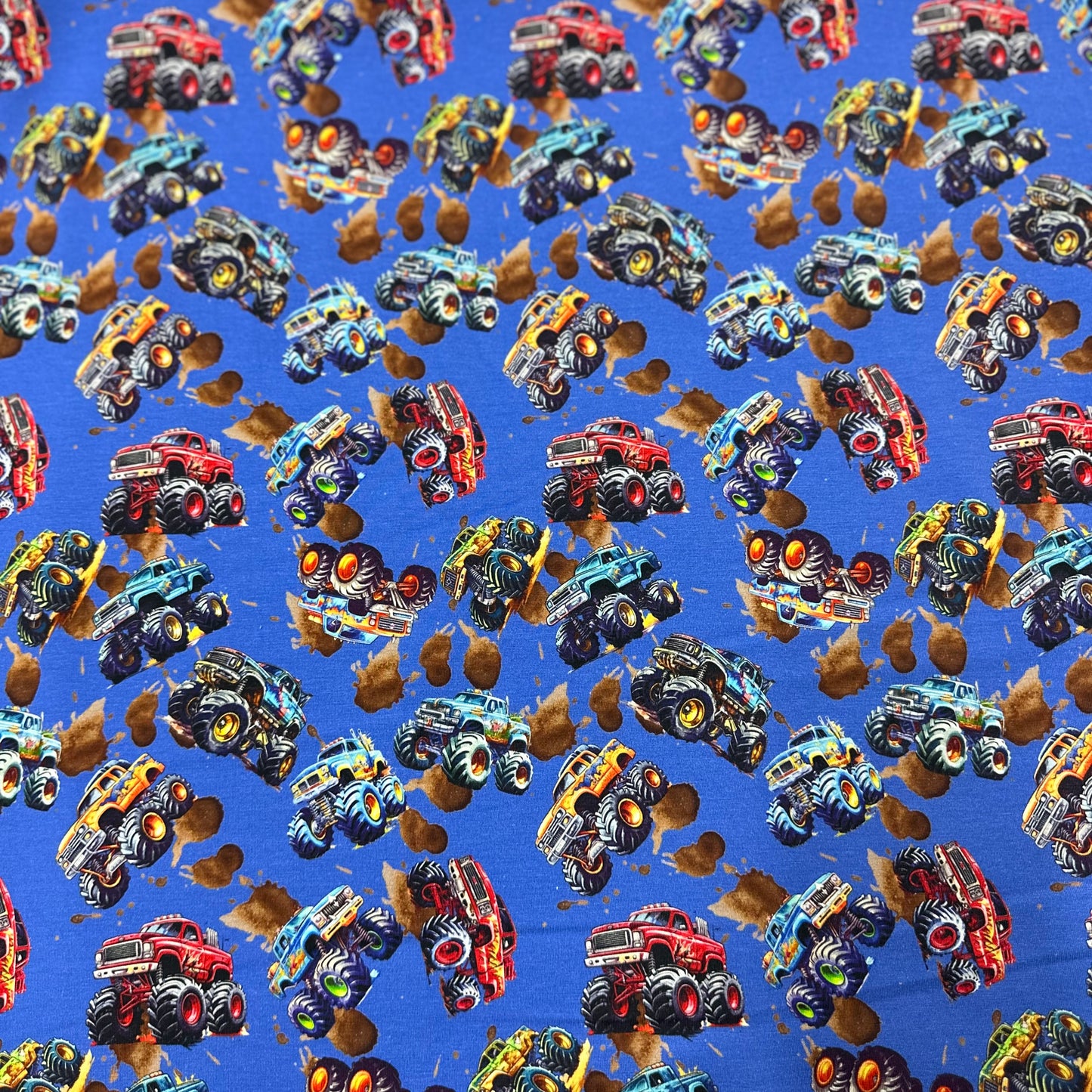 Monster Trucks on Organic Cotton/Spandex Jersey Fabric - Nature's Fabrics