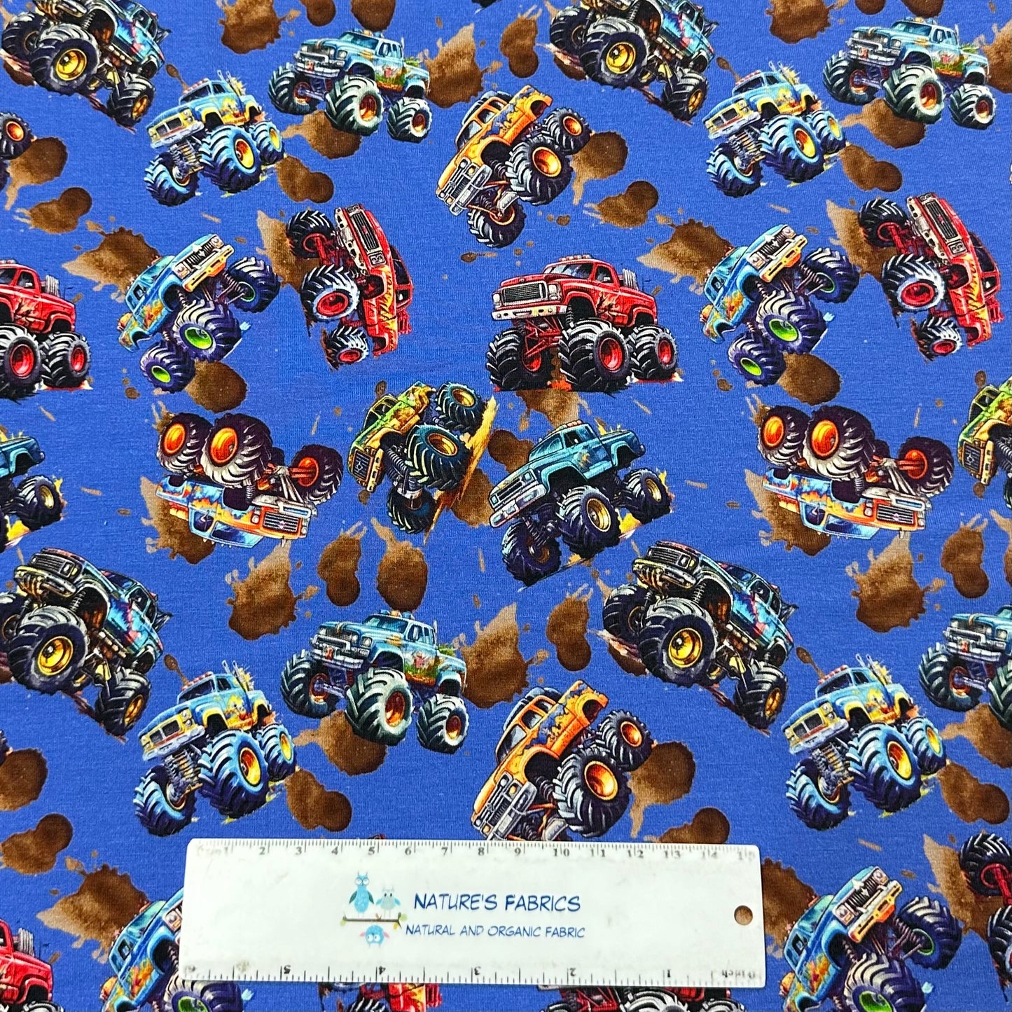 Monster Trucks on Organic Cotton/Spandex Jersey Fabric - Nature's Fabrics