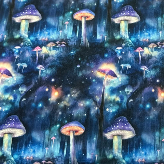 Nature's Fabrics mystical blue forest fabric with glowing purple mushrooms.