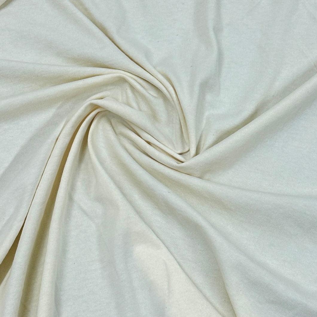 Draped cream-colored natural fabric from Nature's Fabrics.
