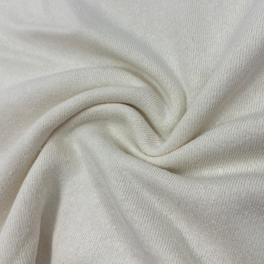 Close-up of draped off-white organic cotton fabric from Nature's Fabrics