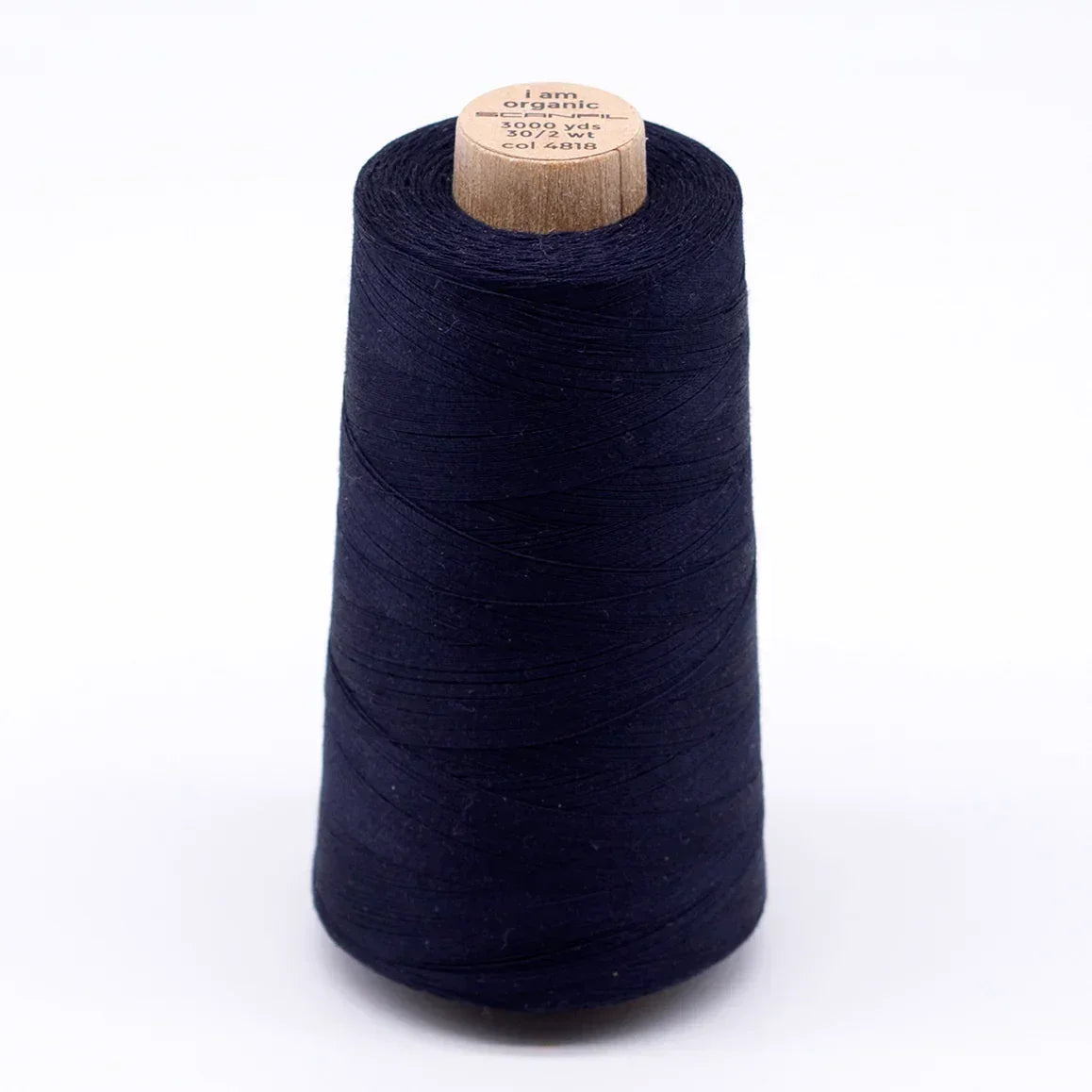 Spool of navy blue organic cotton sewing thread from Nature's Fabrics