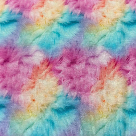 Colorful tie-dye fabric with pink, blue, and yellow swirls from Nature's Fabrics.