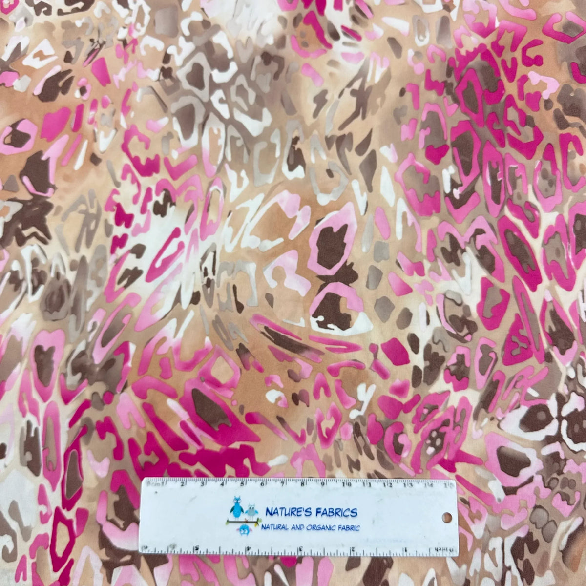 Pink and brown leopard print organic fabric from Nature's Fabrics.