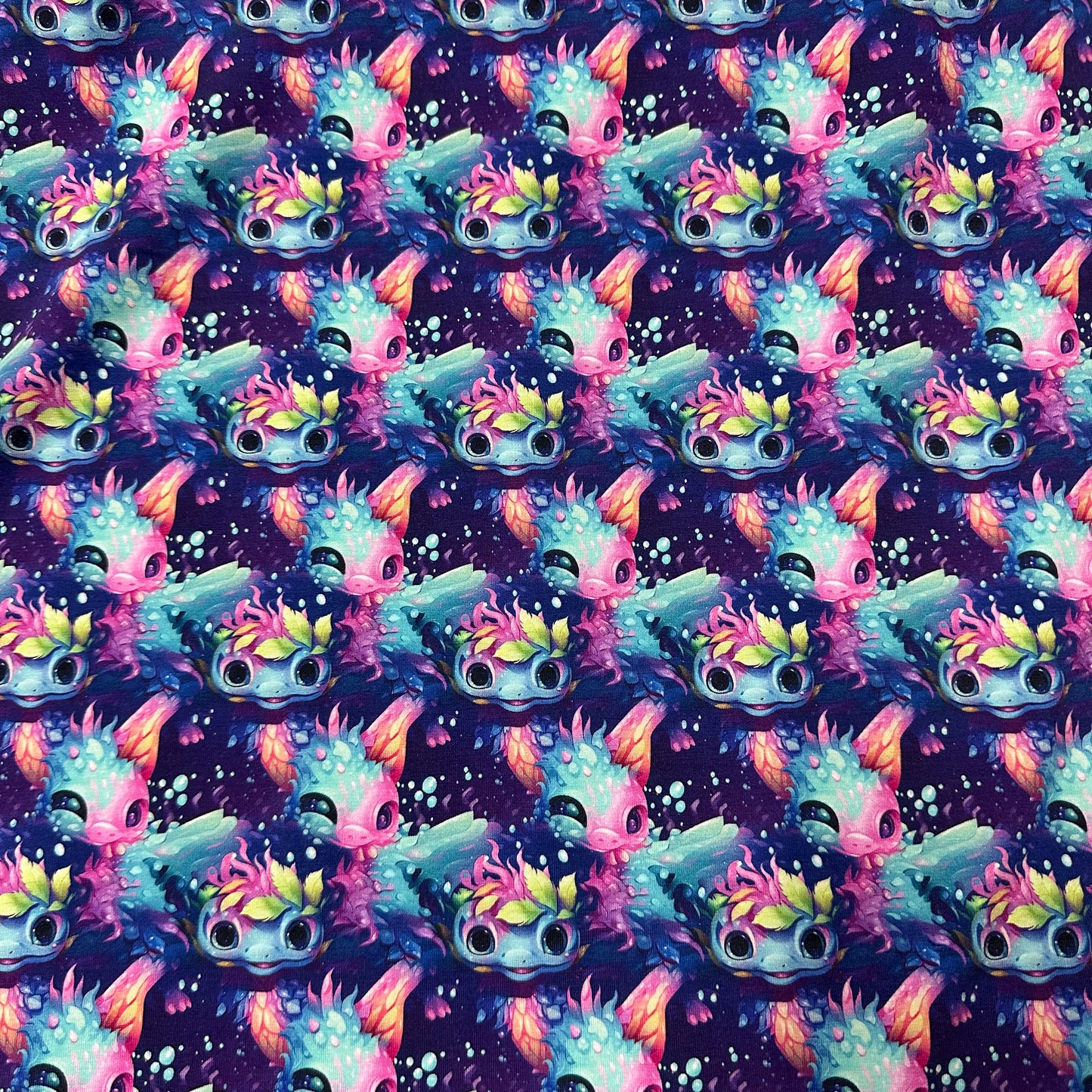 Rainbow Axolotls on Bamboo/Spandex Jersey Fabric - Nature's Fabrics