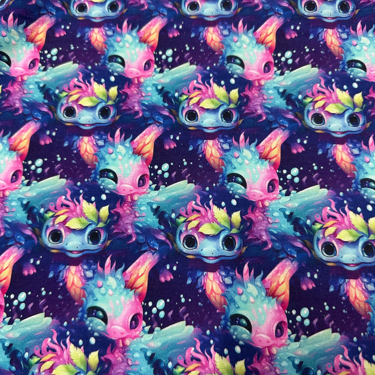 Rainbow Axolotls on Bamboo/Spandex Jersey Fabric - Nature's Fabrics