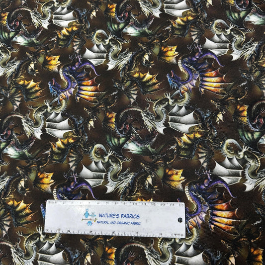 Nature's Fabrics dragon print fabric with a ruler for scale