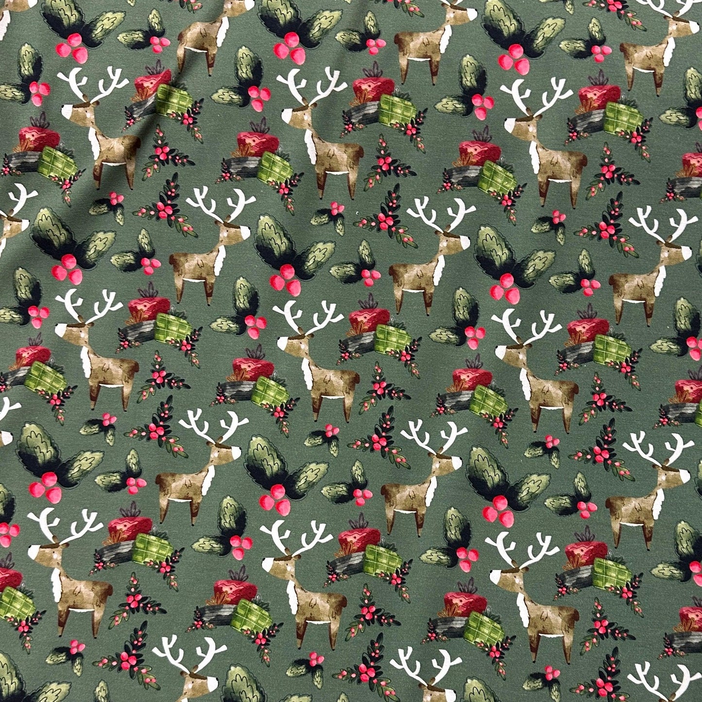 Reindeer Christmas on Green Bamboo/Spandex Jersey Fabric - Nature's Fabrics