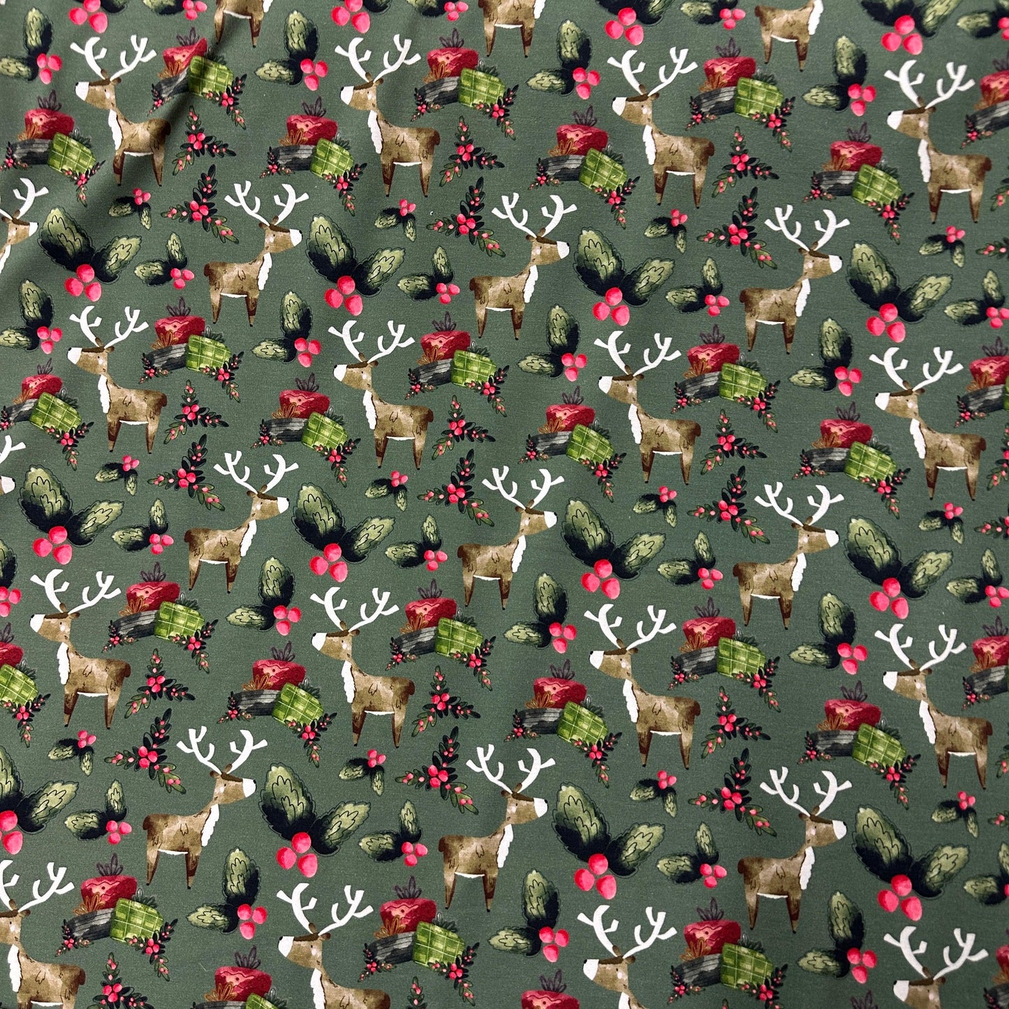 Reindeer Christmas on Green Bamboo/Spandex Jersey Fabric - Nature's Fabrics