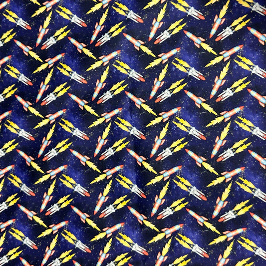 Nature's Fabrics blue space fabric with colorful rocket ship patterns
