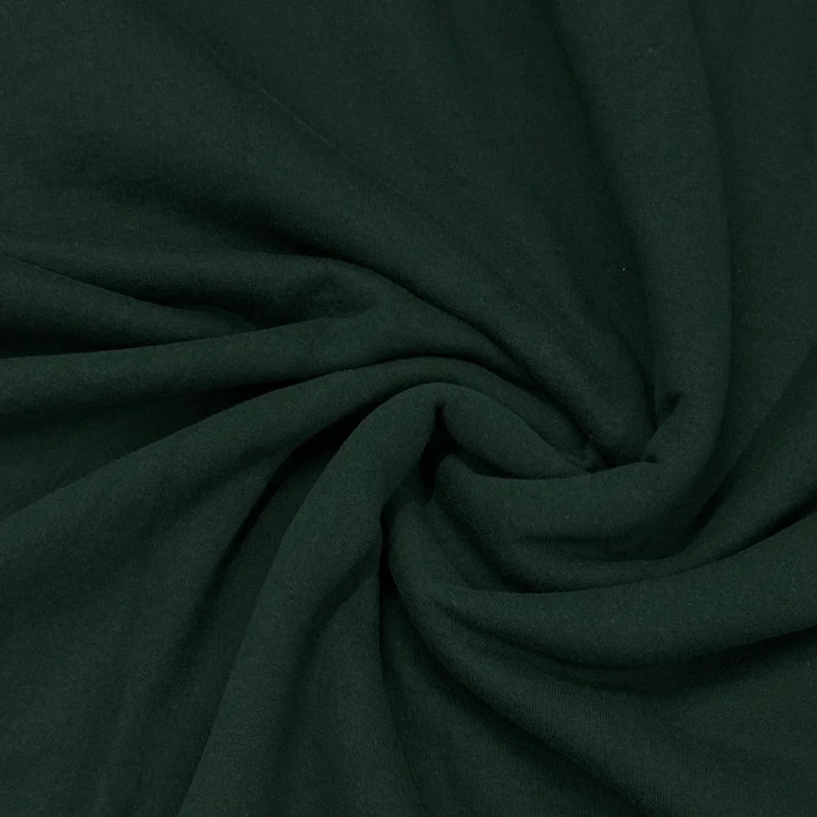 Close-up of draped dark green natural fabric from Nature's Fabrics