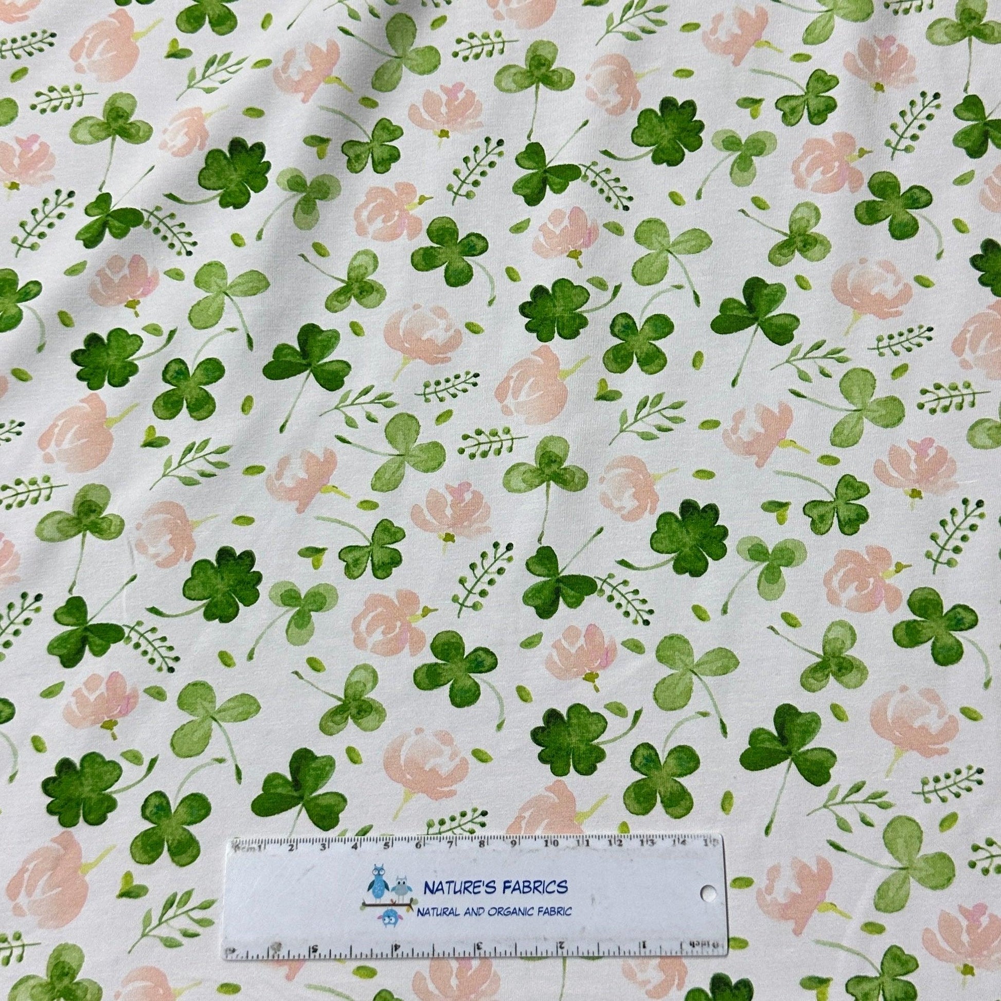 Shamrock and Flowers on White Bamboo/Spandex Jersey Fabric - Nature's Fabrics
