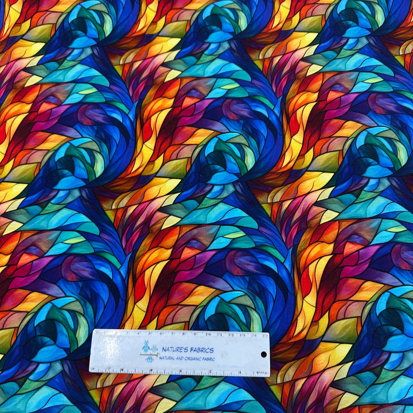 Stained Glass Feathers on Bamboo/Spandex Jersey Fabric - Nature's Fabrics