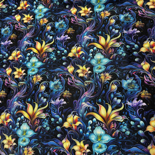 Nature's Fabrics premium floral pattern fabric with vibrant blue and gold botanical designs.