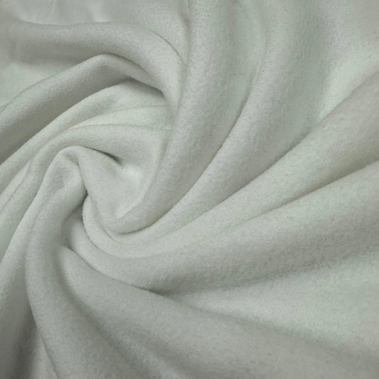 Close-up of soft, swirled white organic fabric from Nature's Fabrics