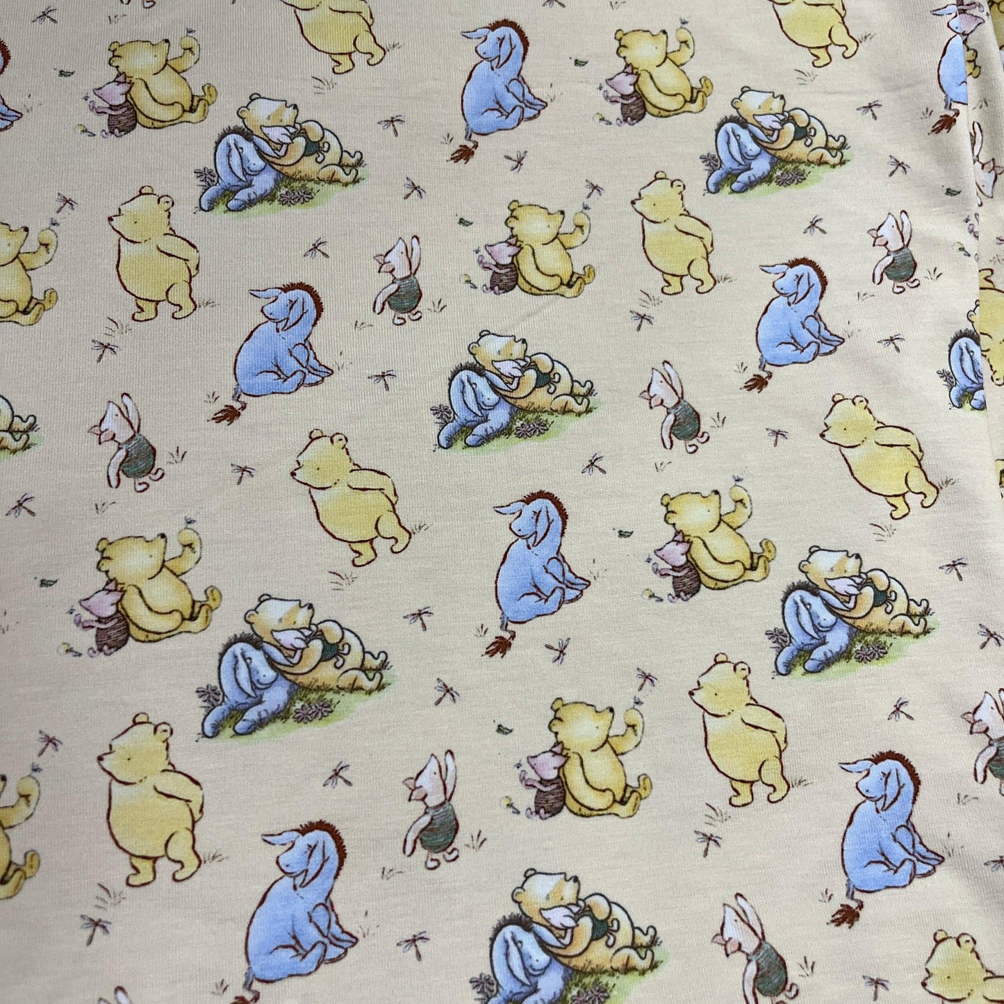 Winnie the Pooh and Friends on Yellow Bamboo/Spandex Jersey Fabric - Nature's Fabrics