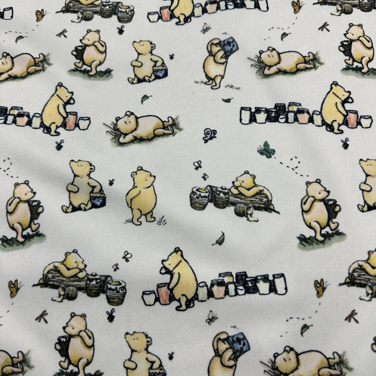 Winnie the Pooh and Honey Pots on Cream 1 mil PUL Fabric - Made in the USA - Nature's Fabrics