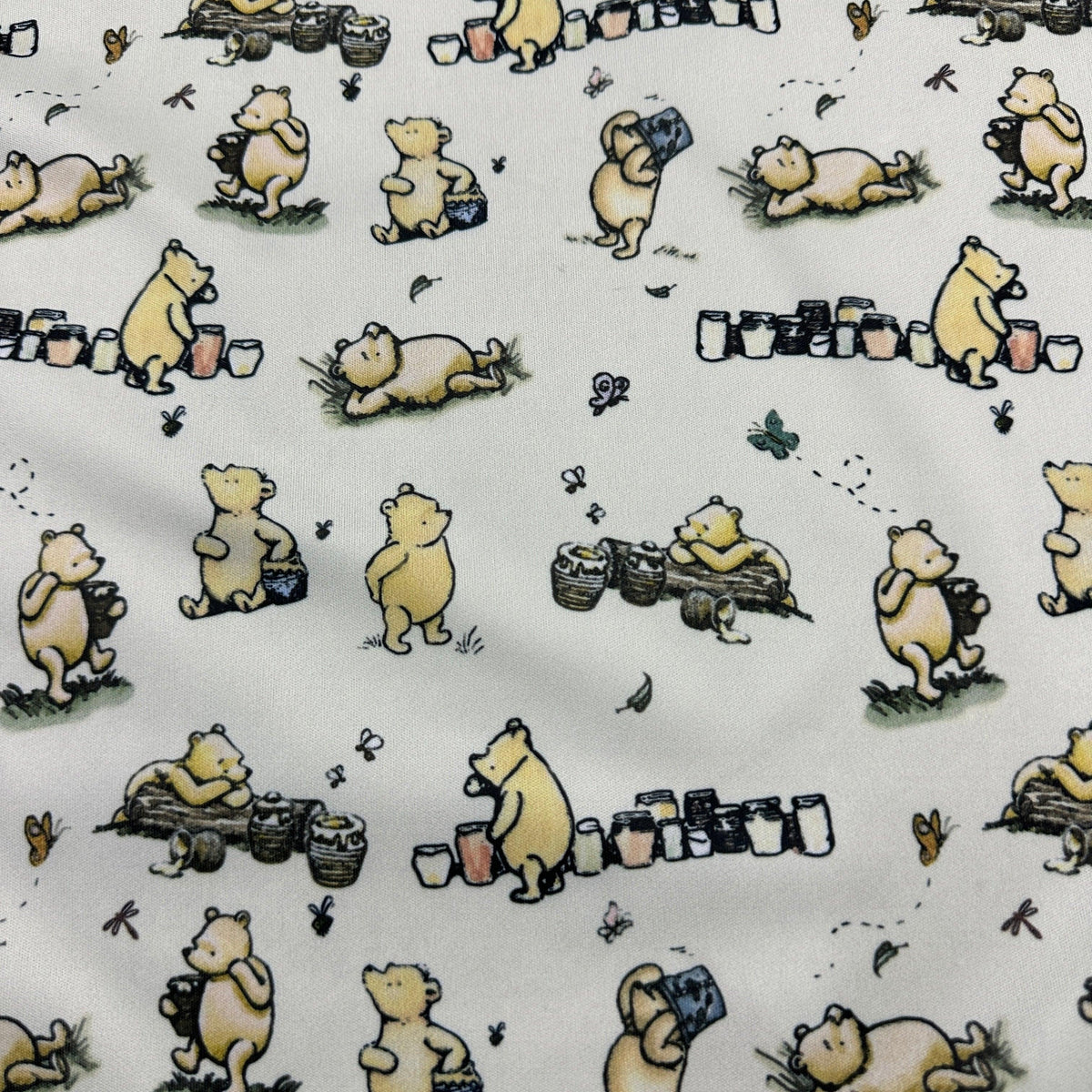 Winnie the Pooh and Honey Pots on Cream 1 mil PUL Fabric - Made in the USA - Nature's Fabrics