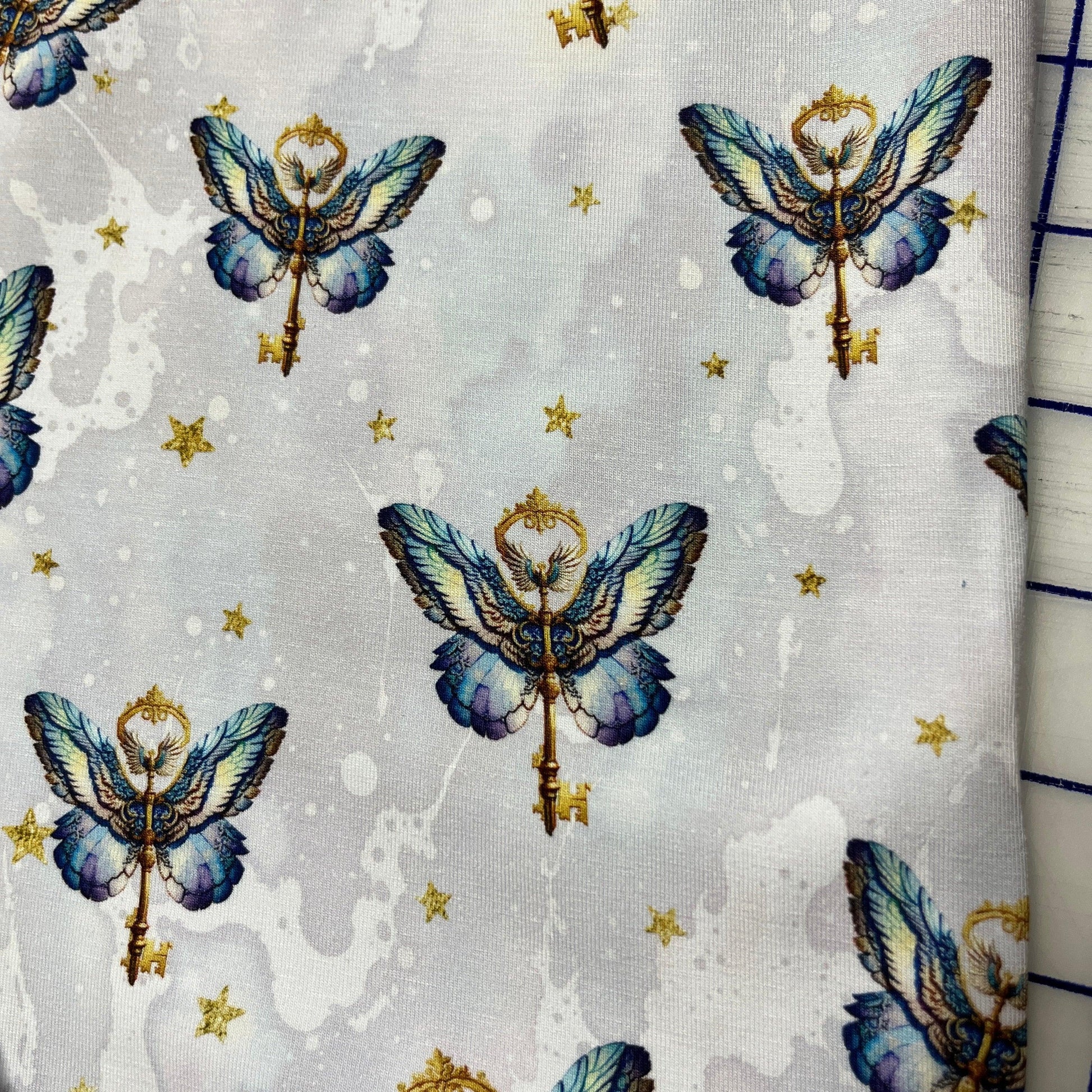 Wizard Pixie Keys on Bamboo/Spandex Jersey Fabric - Nature's Fabrics
