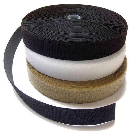 Nature's Fabrics rolls of black, white, and tan elastic webbing ribbons