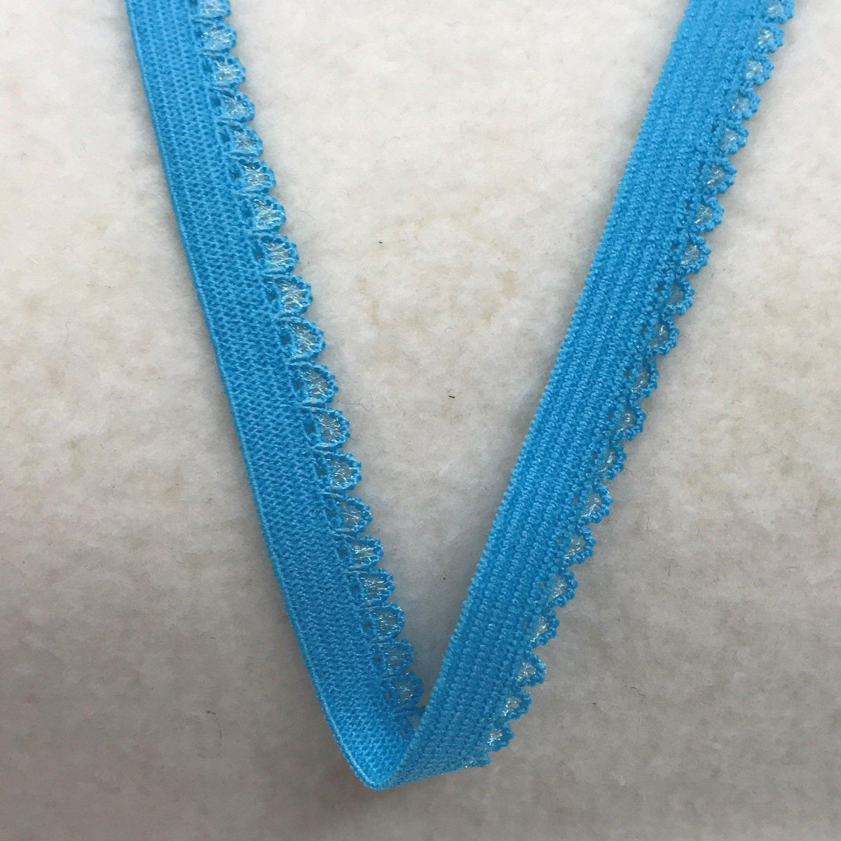 Nature's Fabrics light blue scalloped lace trim ribbon