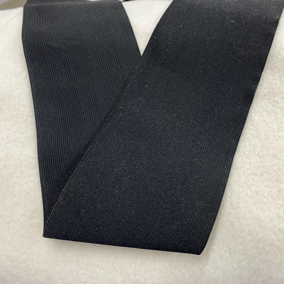 Close-up of black ribbed elastic fabric bands from Nature's Fabrics