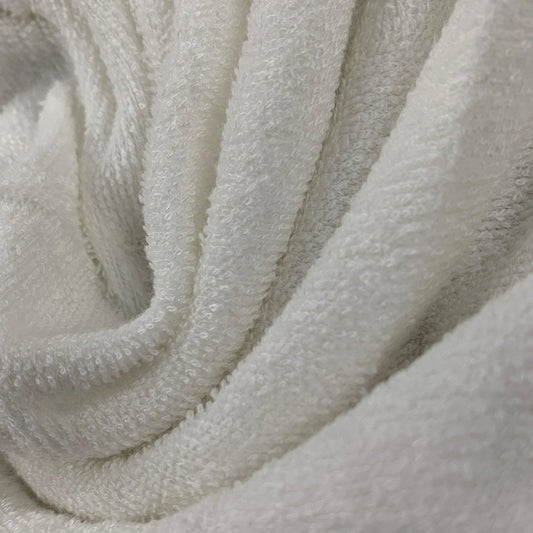 Close-up of white terry cloth fabric from Nature's Fabrics.