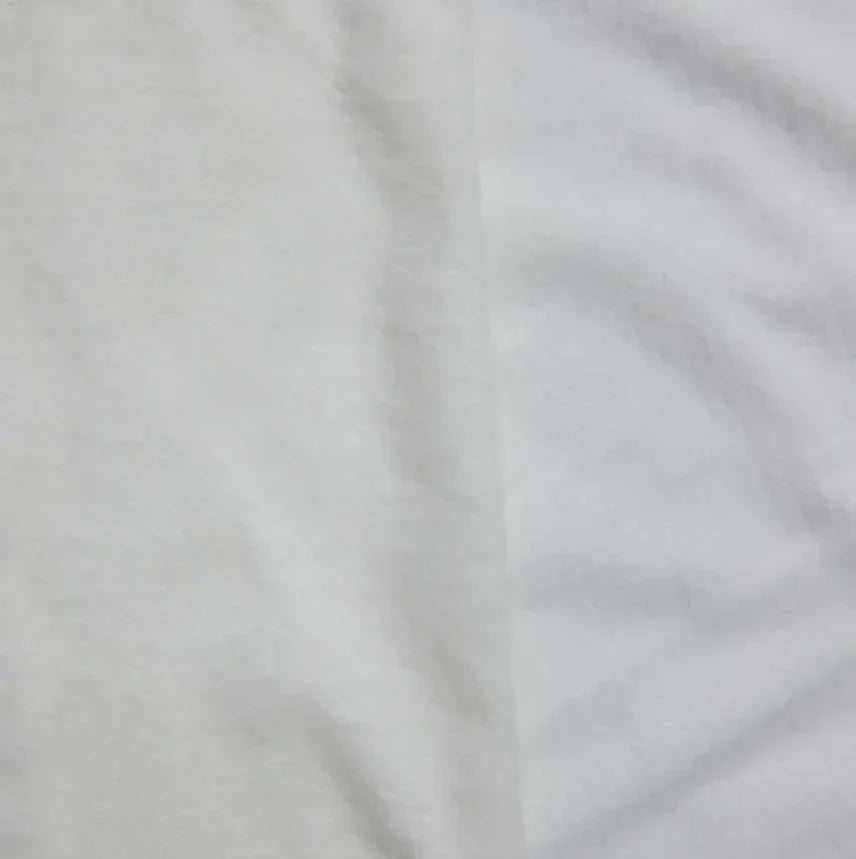 Close-up of white organic cotton fabric from Nature's Fabrics.