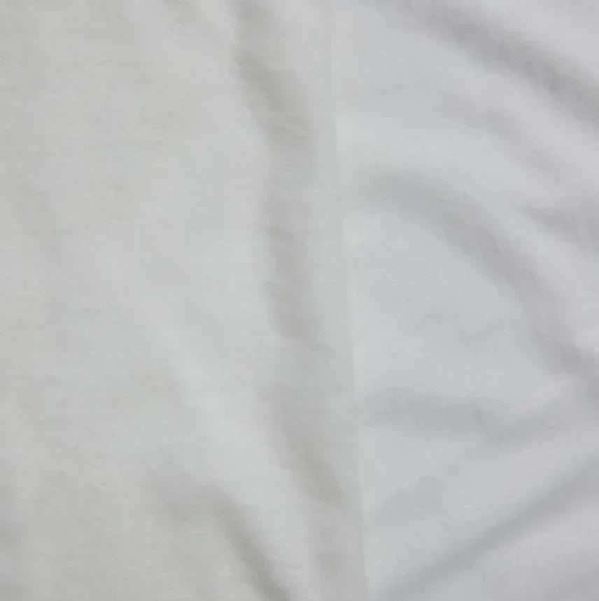 Close-up of white organic cotton fabric from Nature's Fabrics.