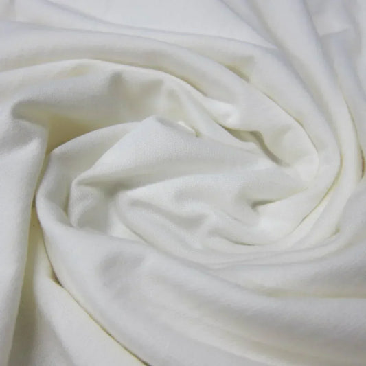 Close-up of draped white organic cotton fabric from Nature's Fabrics.