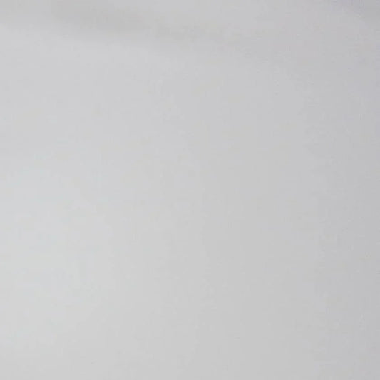 Close-up of a plain light grey natural fabric from Nature's Fabrics.