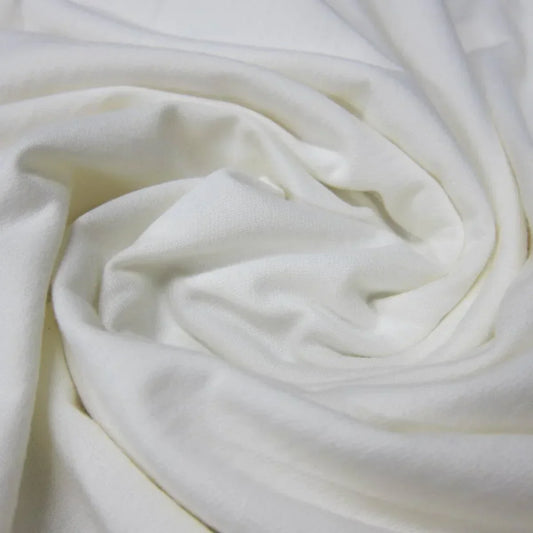 Close-up of draped white organic cotton fabric from Nature's Fabrics